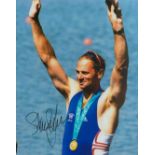 Olympics. Sir Steve Redgrave Signed 10 x 8 inch Colour Photo Showing Gold Medal Celebrations in