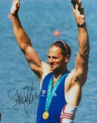 Olympics. Sir Steve Redgrave Signed 10 x 8 inch Colour Photo Showing Gold Medal Celebrations in