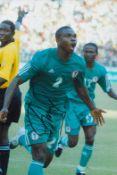 Football Joseph Yobo signed 12x8 inch colour photo pictured while playing for Nigeria. Good