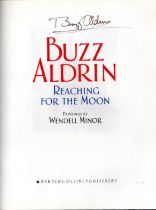 Buzz Aldrin signed hardback book titled Reaching for the Moon paintings by Wendell Minor signature