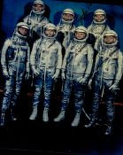 John Glenn signed 10x8inch colour crew photo in spacesuits. From single vendor Space Astronaut