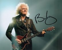 Brian May signed 10x8 inch colour photo. Good condition. All autographs are genuine hand signed