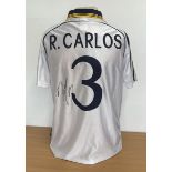 Roberto Carlos signed Real Madrid retro replica home shirt. Signature on back. Size Medium. Good