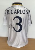 Roberto Carlos signed Real Madrid retro replica home shirt. Signature on back. Size Medium. Good