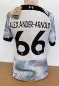 Trent Alexander Arnold signed Liverpool F.C replica away shirt. Size Small. Good condition. All