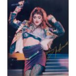 Madonna signed 10x8 inch colour photo. Good condition. All autographs are genuine hand signed and