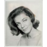 Lauren Bacall signed 10x8 inch original black and white photo pictured from the film The Moving