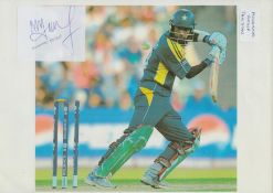 Mohammad Yousuf signed Autograph cut out Approx. 3x2.25 Inch fixed onto a colour photo 11.75x8.25