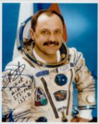 Cosmonaut Yuri Usachev Portrait signed 10 x 8 colour photo in Space Suit inscribed with his missions