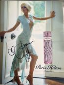 Paris Hilton Model and Actress 10x8 inch signed advertising photo. Good condition. All autographs