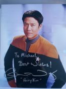 Garret Wang Star Trek Cast Member 10x8 inch signed photo. Good condition. All autographs are genuine