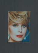 Joanna Lumley signed colour photo, mounted to approx. size 12xx8inch. Good condition. All autographs