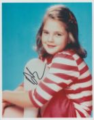 Drew Barrymore signed 10x8inch colour photo. Good condition. All autographs are genuine hand