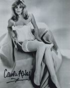 007 James Bond movie Octopussy actress Carole Ashby signed sexy lingerie photo. Good condition.