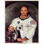 Michael Collins signed 10x8 inch original NASA colour photo pictured in Space suit. Good
