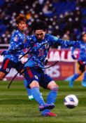 Football Takumi Minamino signed 12x8 inch colour photo pictured in action for Japan. Good condition.