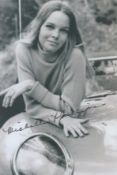 Michelle Phillips of the Mamas and Papas signed 6x4inch black and white photo. Good condition. All