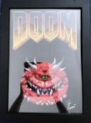 John Romero signed Doom illustrated piece. Framed to approx. size 18x14inch. Good condition. All