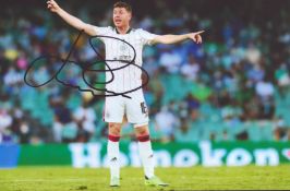 Football James McCarthy signed Celtic F.C 12x8 inch colour photo. Good condition. All autographs are