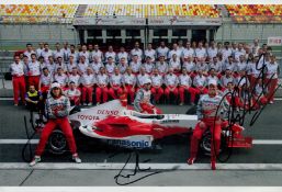 Jarno Trulli, Ricardo Zonta & Ralf Schumacher Signed Colour Photo Picturing the Toyota Team in