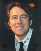 Jonathan Ross signed 10x8 inch colour photo. Good condition. All autographs are genuine hand
