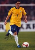 Elano signed 12x8 inch colour photo pictured in action for Brazil. Good condition. All autographs