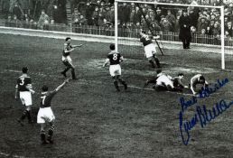 Frank Blunstone signed 12x8 inch black and white colour photo playing football. Good condition.