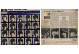 Beatles original Parlophone Hard Day 33 rpm vinyl record with album sleeve slight tear on the