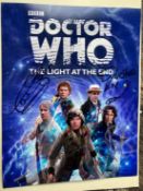Dr Who four Doctors signed 10 x 8 inch colour photo. Autographed by Tom and Colin Baker, Sylvester