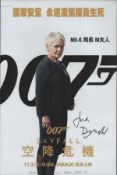 Judi Dench signed 12x8inch colour James Bond photo. Good condition. All autographs are genuine