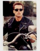Arnold Schwarzenegger signed 10x8 inch Terminator colour photo signature a little faded. Good