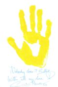 007 Bond girl Caroline Munro handprint, an actual print of her hand, in yellow acrylic paint on high