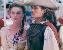 Keira Knightly and Orlando Bloom signed Pirates of the Caribbean 10x8 inch colour photo. Good