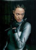 Angelina Jolie signed Tomb Raider 10x8 inch colour photo. Good condition. All autographs are genuine