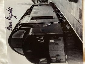 Great Train robber Bruce Reynolds signed 12 x 8 inch b/w photo of train. Good condition. All