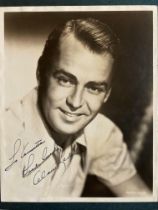 Alan Ladd signed 10 x 8 vintage sepia photo mounted to green backing. Dedicated. Good condition. All