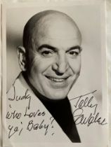 Telly Savalas signed 7 x 5 b/w portrait photo, inscribes Judy Who Loves Ya Baby!. Good condition.