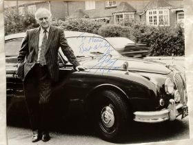 John Thaw as Inspector Morse signed 10 x 8 b/w photo leaning on the famous Jaguar car. To Maxine.