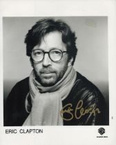 Eric Clapton signed 10x8 inch black and white promo photo. Good condition. All autographs are