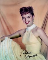 Debbie Reynolds signed 10x8 inch colour photo. Good condition. All autographs are genuine hand