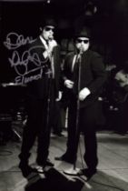 Dan Ackroyd signed 12x8inch black and white photo. Good condition. All autographs are genuine hand