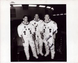 Frank Borman signed NASA original 10x8 inch black and white photo pictured in space suit. Good
