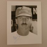Ian Botham Cricket Legend autograph on a 10 inch x 8 inch black and white photograph of himself