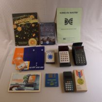 A collection of vintage calculators , computer , technology related items comprising a vintage