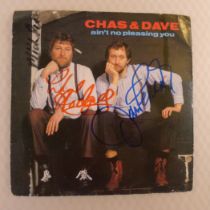 A signed Chas and Dave 7 inch vinyl single ain't no pleasing you 1982 signed on the front of the