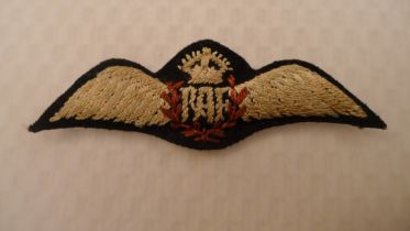 WW2 An original pair of Royal Air Force (RAF) embroidered cloth padded pilots wings. These