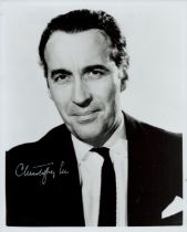 Christopher Lee signed black and white photo head and shoulders portrait. Was an English actor and