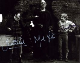 Oliver multi signed 10x8 inch black and white photo includes cast members Jack Wild, Mark Lester and