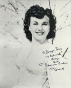 Deanna Durbin Signed 10x8 inch Black and White Photo. Signed in black ink. Dedicated. Good