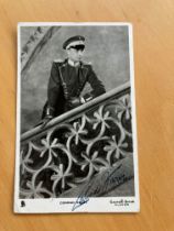 Conrad Veidt signed vintage Tuck b/w postcard, in uniform, wearing monocle, standing on stairs.